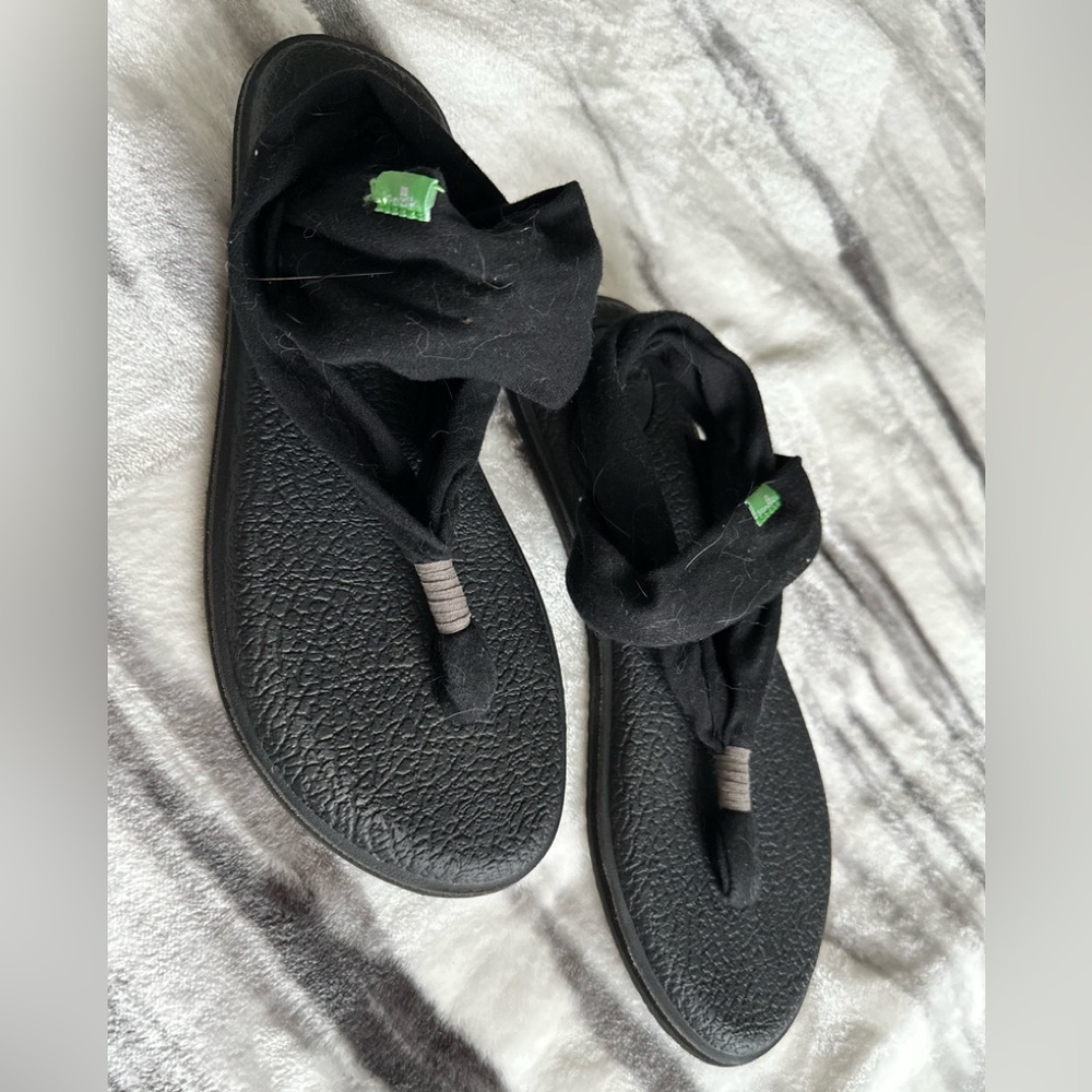 Woman’s Sanuks Black Sandals